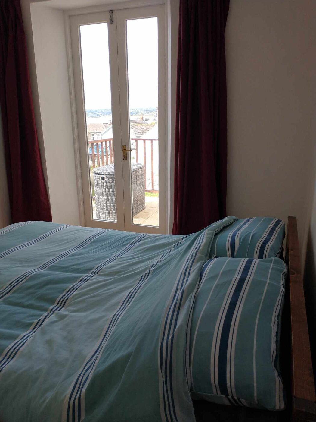 Double bedroom with French doors opening to the balcony