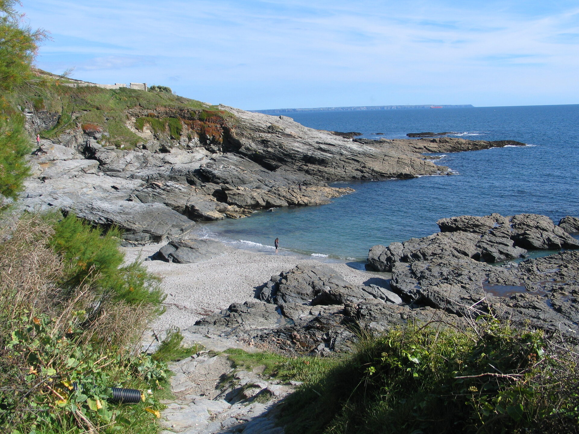 Rocky cove with clear water near Marazion